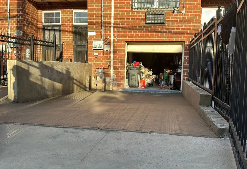 Concrete sidewalk in the Bronx, showcasing a smooth and durable finish with a clean, well-maintained appearance.